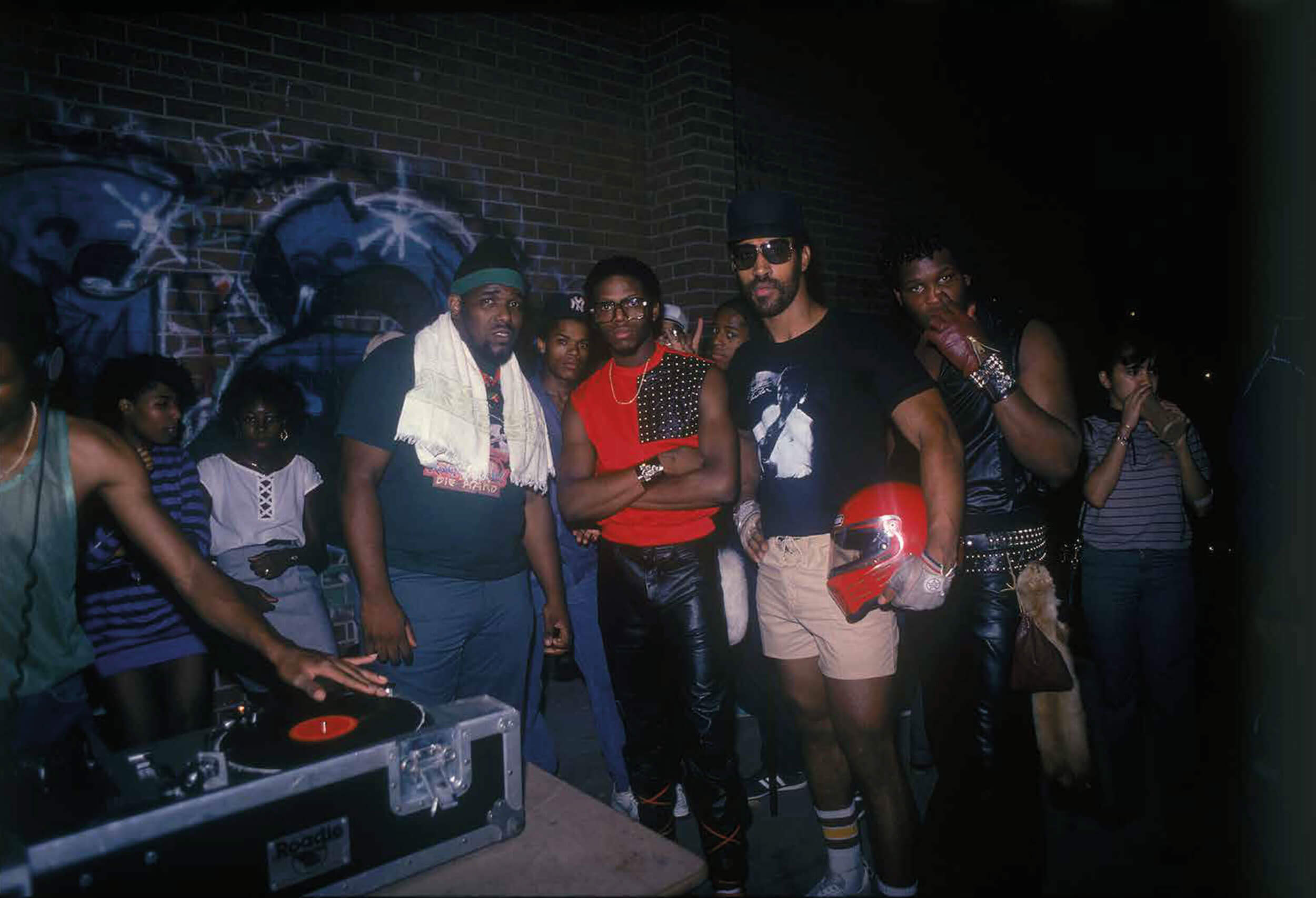 Afrika Bambaataa, D.St, Kool Herc and Shahiem at Bronx River Center. © Sophie Bramly, New York